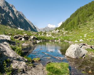 Preview wallpaper lake, mountains, stones, rocks, valley, landscape