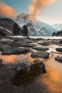 Preview wallpaper lake, mountains, stones, snow, winter, landscape