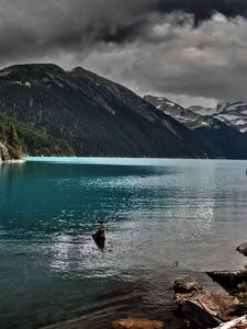 Preview wallpaper lake, mountains, stones, cloudy, despondency