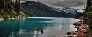 Preview wallpaper lake, mountains, stones, cloudy, despondency