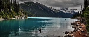 Preview wallpaper lake, mountains, stones, cloudy, despondency