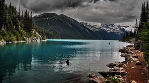 Preview wallpaper lake, mountains, stones, cloudy, despondency