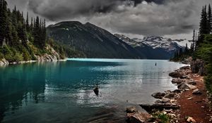 Preview wallpaper lake, mountains, stones, cloudy, despondency