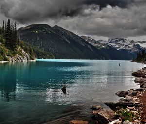 Preview wallpaper lake, mountains, stones, cloudy, despondency