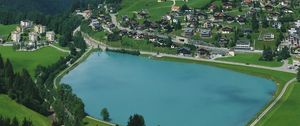Preview wallpaper lake, mountains, village, aerial view, landscape
