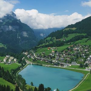 Preview wallpaper lake, mountains, village, aerial view, landscape