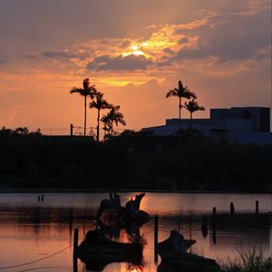 Preview wallpaper lake, palm trees, sunset, dusk, dark