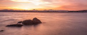 Preview wallpaper lake, pebbles, stones, hills, sunrise