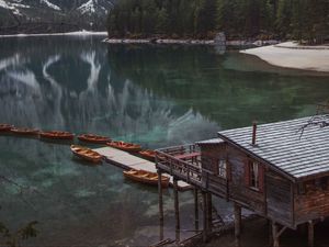 Preview wallpaper lake, pier, boats, mountain, trees, shore