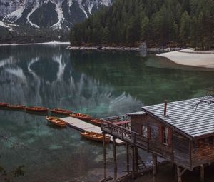 Preview wallpaper lake, pier, boats, mountain, trees, shore