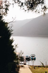 Preview wallpaper lake, pier, boats, shore, nature