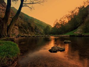 Preview wallpaper lake, pond, stones, trees, twilight, grass, evening