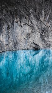 Preview wallpaper lake, rock, cliff, water, mountain