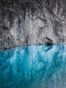 Preview wallpaper lake, rock, cliff, water, mountain