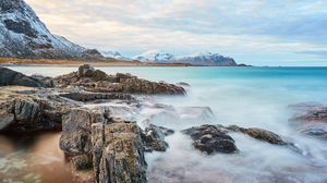 Preview wallpaper lake, rocks, mountains, snow, snowy