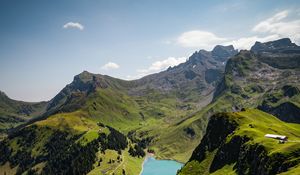 Preview wallpaper lake, rocks, mountains, peaks, grass