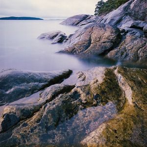 Preview wallpaper lake, rocks, shore, water, island