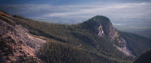 Preview wallpaper lake, rocks, slope, peaks, fog