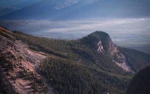 Preview wallpaper lake, rocks, slope, peaks, fog