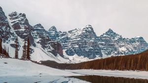 Preview wallpaper lake, rocks, stones, snow, snowy