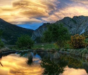 Preview wallpaper lake, round, coast, sky, mountains