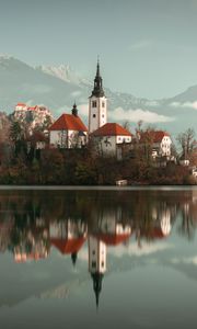 Preview wallpaper lake, shore, buildings, mountains, forest, water