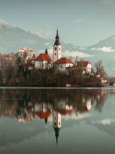 Preview wallpaper lake, shore, buildings, mountains, forest, water