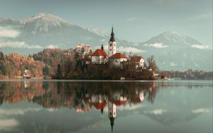 Preview wallpaper lake, shore, buildings, mountains, forest, water