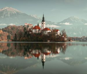 Preview wallpaper lake, shore, buildings, mountains, forest, water