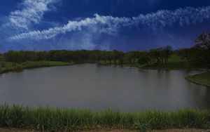 Preview wallpaper lake, shore, grass, trees, sky, clouds, water, nature