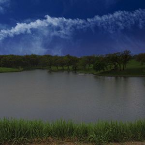 Preview wallpaper lake, shore, grass, trees, sky, clouds, water, nature