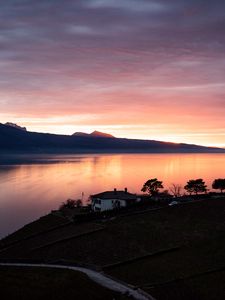 Preview wallpaper lake, shore, houses, mountains, evening