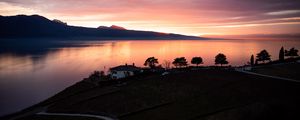 Preview wallpaper lake, shore, houses, mountains, evening