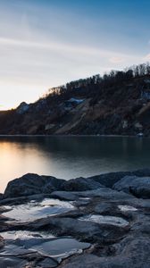 Preview wallpaper lake, shore, rocks, dusk, nature