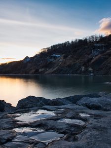 Preview wallpaper lake, shore, rocks, dusk, nature