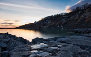 Preview wallpaper lake, shore, rocks, dusk, nature