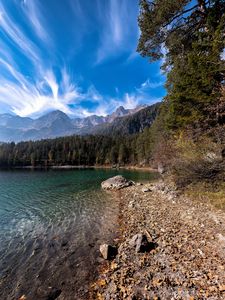 Preview wallpaper lake, shore, stones, forest, mountains