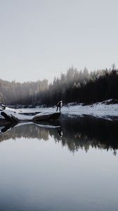 Preview wallpaper lake, silhouette, stone, snow, trees, reflection