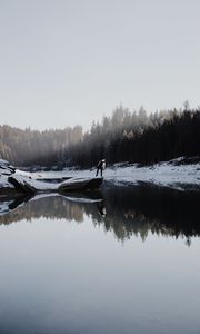 Preview wallpaper lake, silhouette, stone, snow, trees, reflection