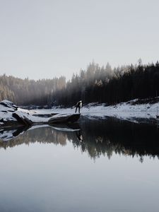 Preview wallpaper lake, silhouette, stone, snow, trees, reflection
