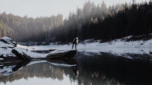 Preview wallpaper lake, silhouette, stone, snow, trees, reflection