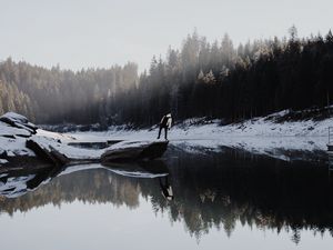 Preview wallpaper lake, silhouette, stone, snow, trees, reflection