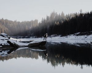 Preview wallpaper lake, silhouette, stone, snow, trees, reflection