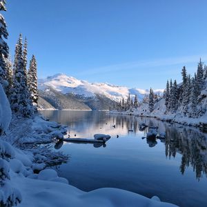 Preview wallpaper lake, snow, mountain, shore, winter, nature