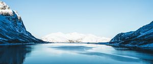 Preview wallpaper lake, snow, mountains, sky, trees, coast, winter