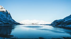 Preview wallpaper lake, snow, mountains, sky, trees, coast, winter