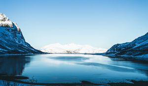 Preview wallpaper lake, snow, mountains, sky, trees, coast, winter