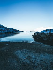 Preview wallpaper lake, snow, mountains, sky, winter, sand, shore