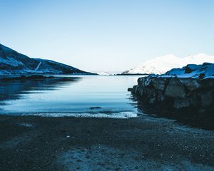 Preview wallpaper lake, snow, mountains, sky, winter, sand, shore