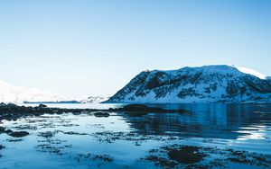 Preview wallpaper lake, snow, mountains, sky, winter, snowy